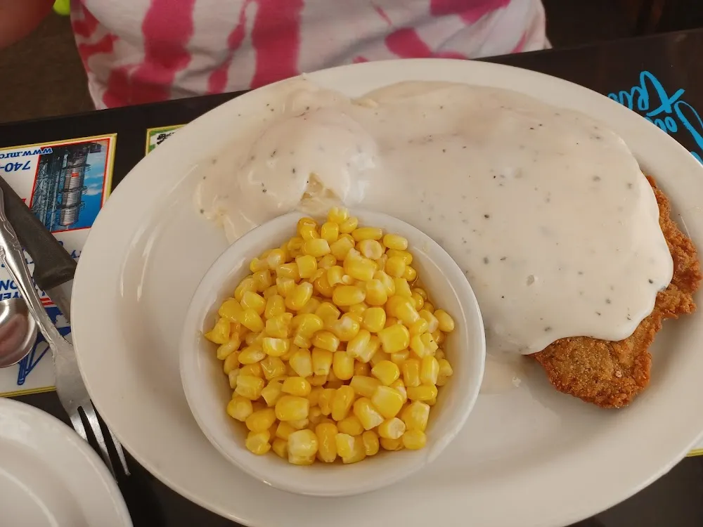 Country Fried Steak 2 Eggs Any Style Served with Hash